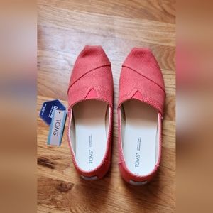 *never worn* Tom's size W11 (runs small)